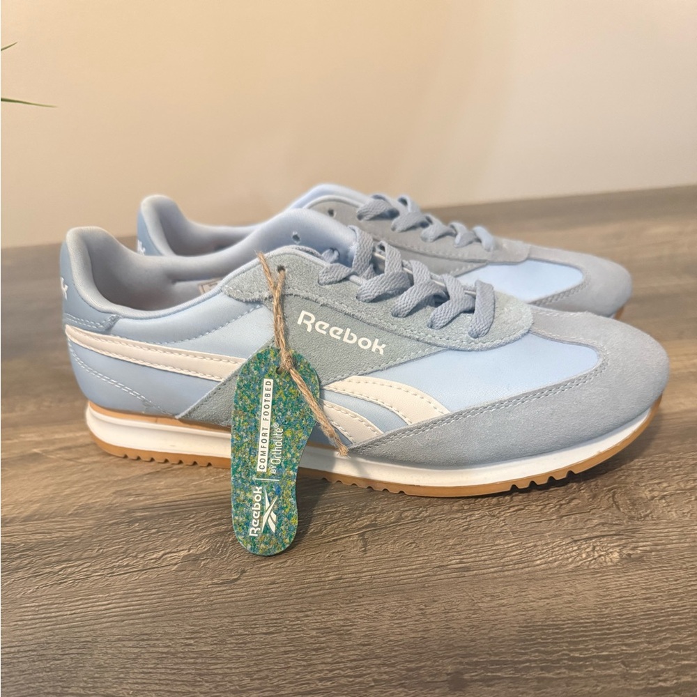 NWT women’s Reebok Fiori Pale Blue & White Retro Sneakers, size 9.5, never worn.
